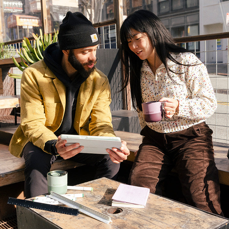 12oz-rise-mug-l9 12oz_rise_coffee_mug_dusty_orchid_couple_city_patio_square.jpg