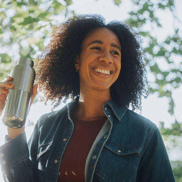 bring-your-own-party-kit-tumblers-and-cocktails-c9 16oz_rise_reflect_woman_smile_square.jpg