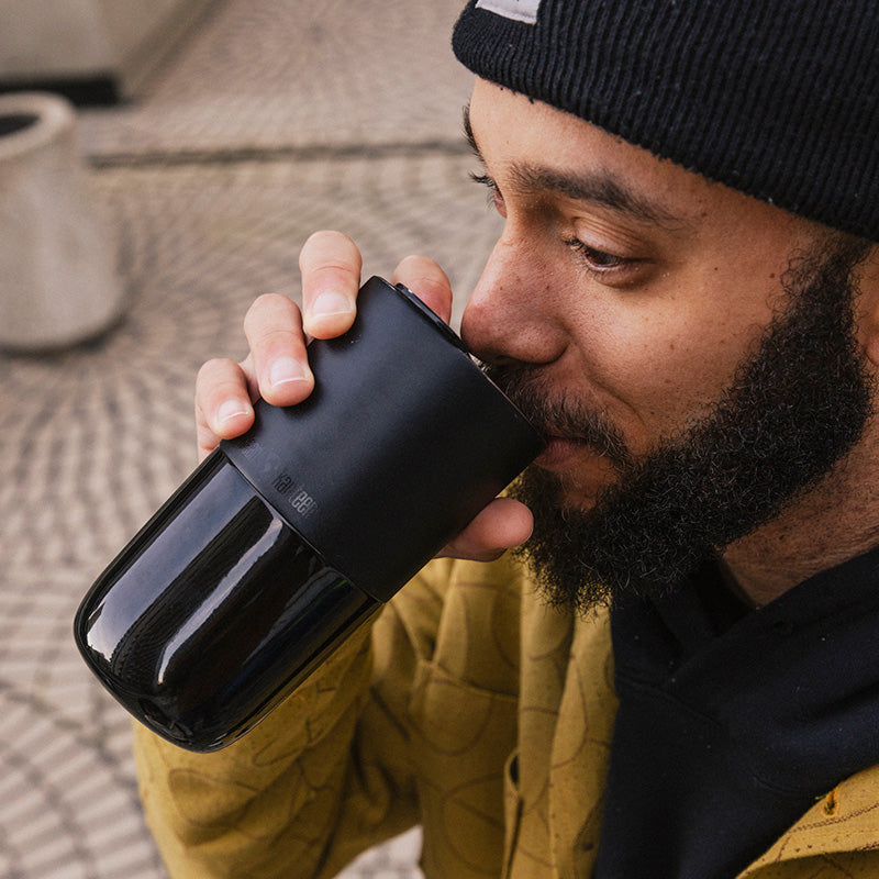 16oz-rise-tumbler-p4 16oz_rise_tumbler_black_man_drink_square.jpg