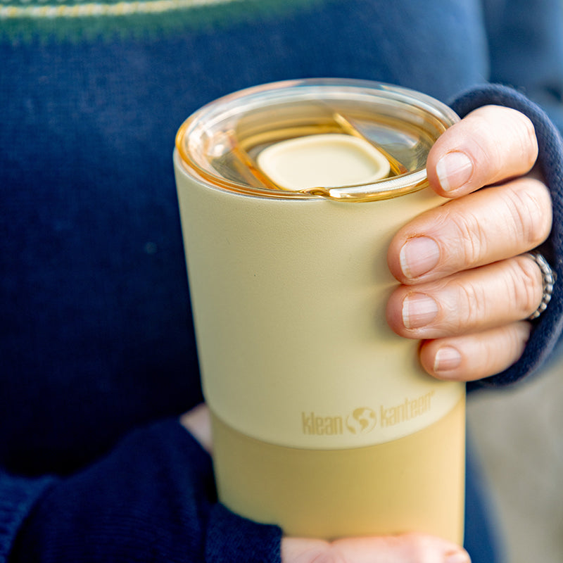 daily-on-the-go-set-b3 16oz_rise_tumbler_wax_yellow_closeup_hand_lid_square.jpg