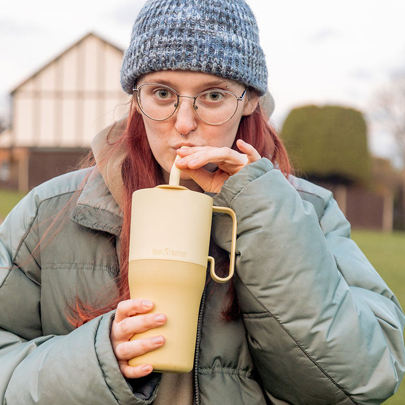 26oz-rise-tumbler-with-straw-lid-j0 26oz_rise_rumbler_straw_wax_yellow_woman_sip_square.jpg