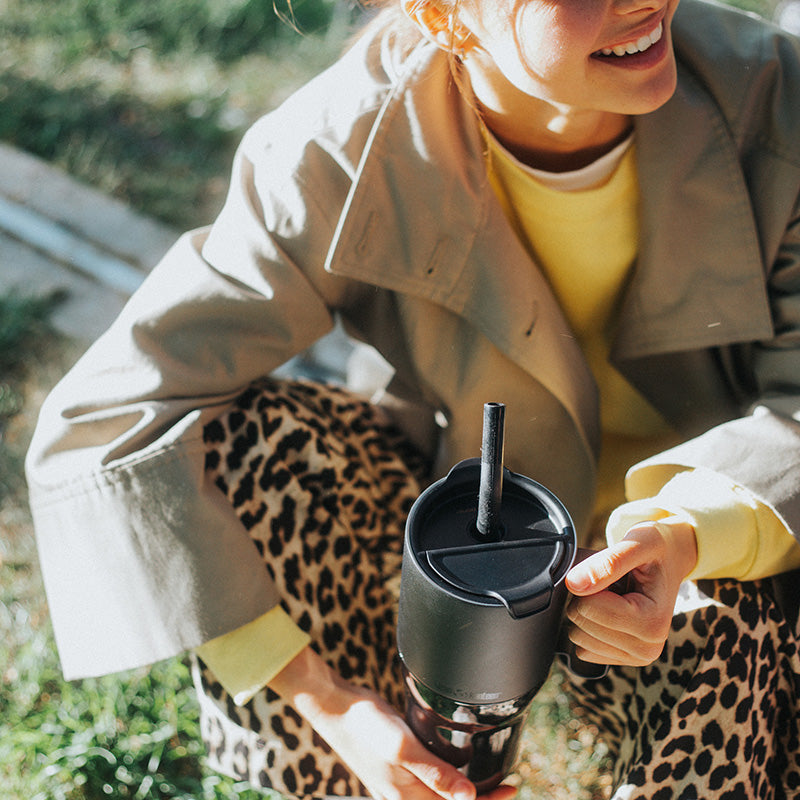26oz-rise-tumbler-with-straw-lid-j0 26oz_rise_tumbler_black_woman_topview_square.jpg