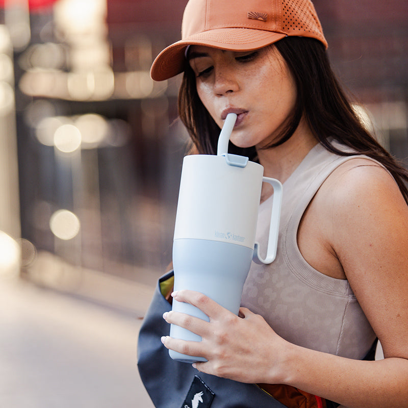 36oz-rise-tumbler-with-straw-lid-y5 36oz_rise_tumbler_straw_girl_sip_square.jpg