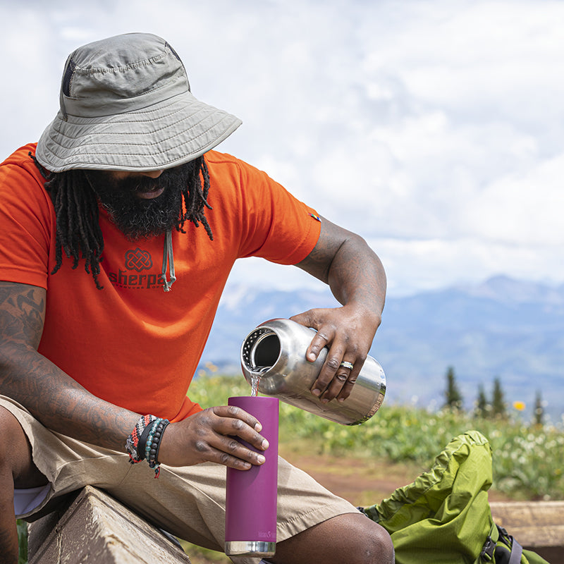 64oz-tkwide-with-loop-cap-n1 tkwide_64oz_bottle_backpacker_mountains_filling_square.jpg