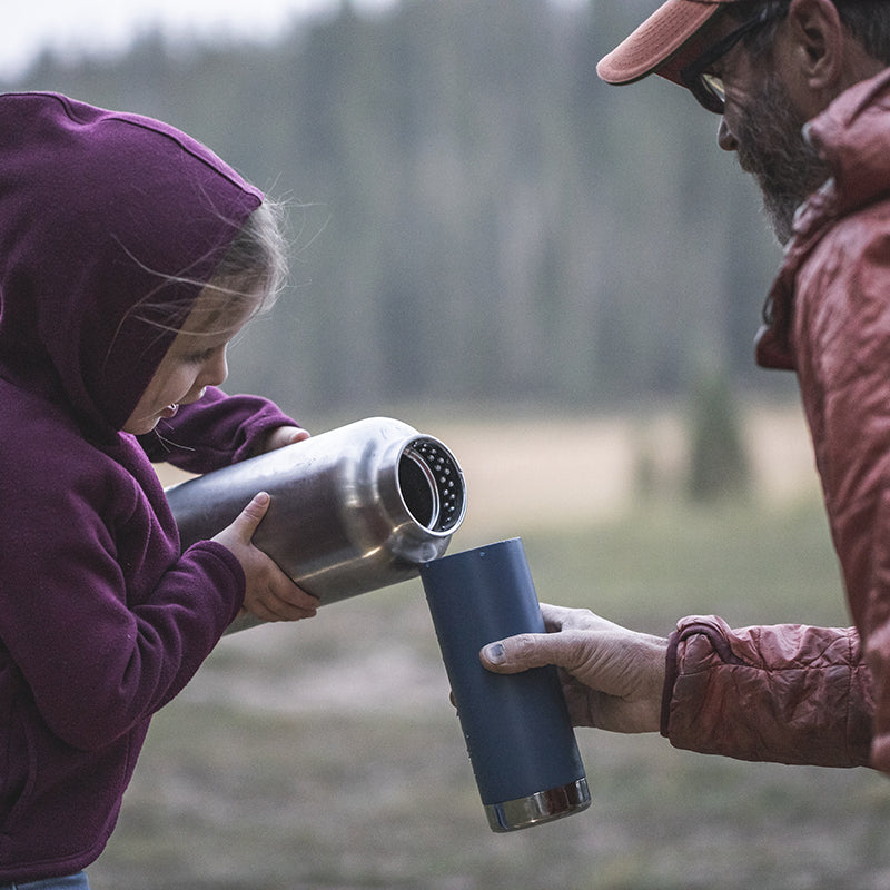 64oz-tkwide-with-loop-cap-n1 tkwide_64oz_bottle_girl_dad_filling_square.jpg